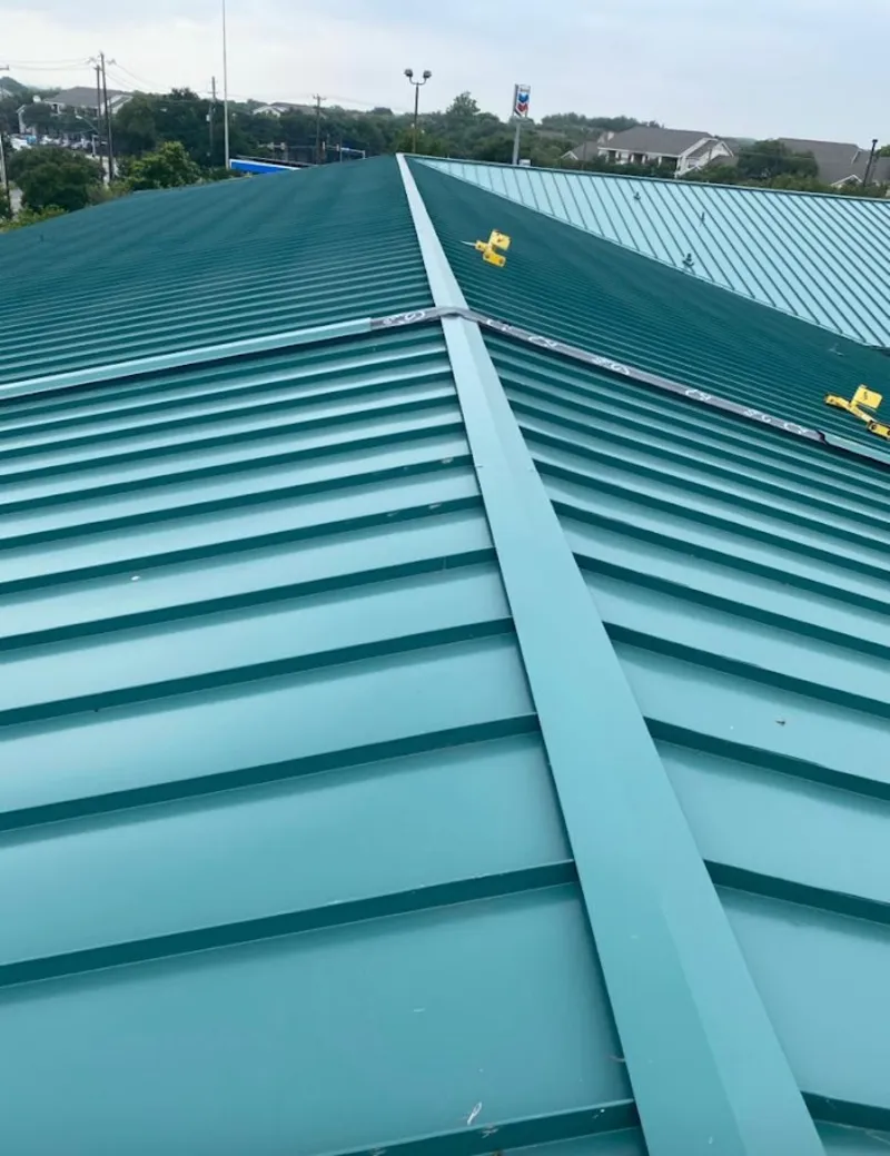 Green commercial metal roof ridge and valley for Metal Roof Repair in Algonquin